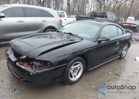 1997 Ford Mustang из США, поврежденный, VIN 1FALP4045VF110894
